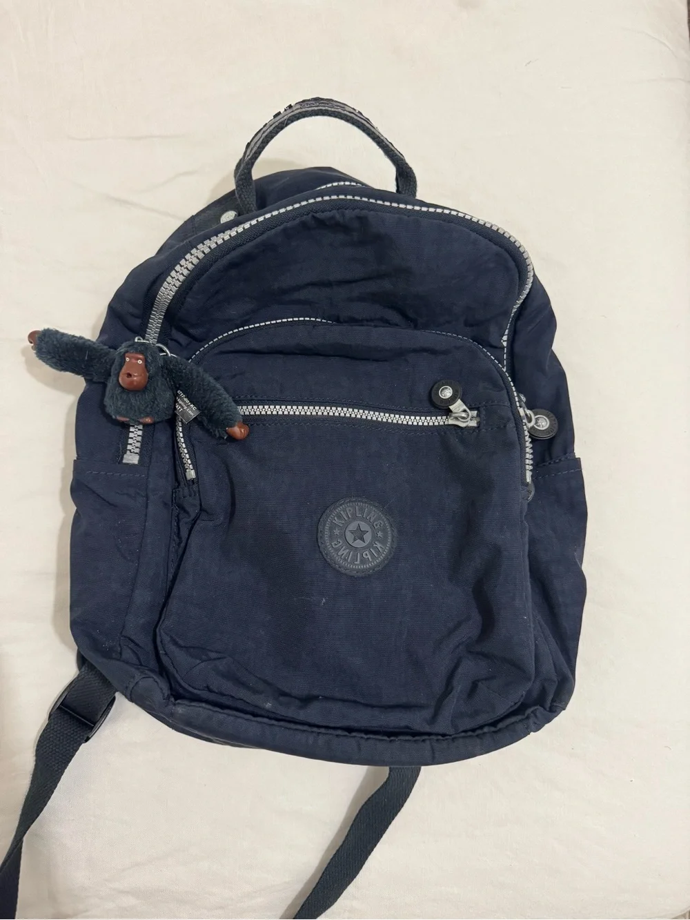 Kipling Navy Blue Compact Backpack with Monkey Keychain